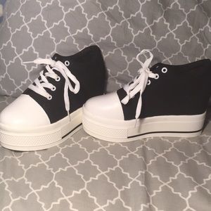 Black and white platform shoes